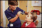 Photograph of a patient having an eye examination at the hospital