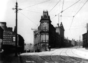 Graphic - Stalybridge Town Hall from Portland Place. Side of building on the left shows large advertisement , circa 1910