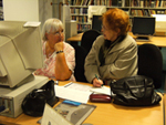 Visitors at Tameside Local Studies and Archives using pcs for family history research