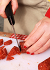 Cutting a sausage