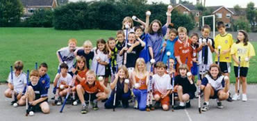 Group photograph of children who have played hockey