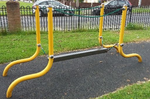 Swinging beam bridge situated on wetpour