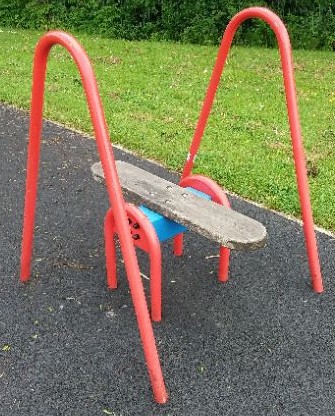 Balance board situated on wetpour
