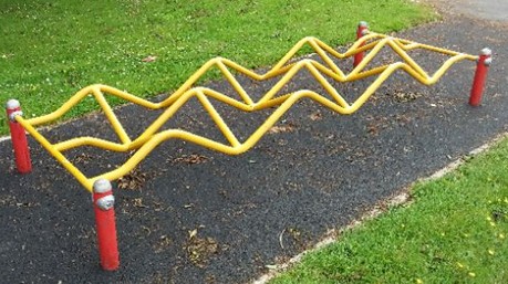 Balance bridge situated on wetpour