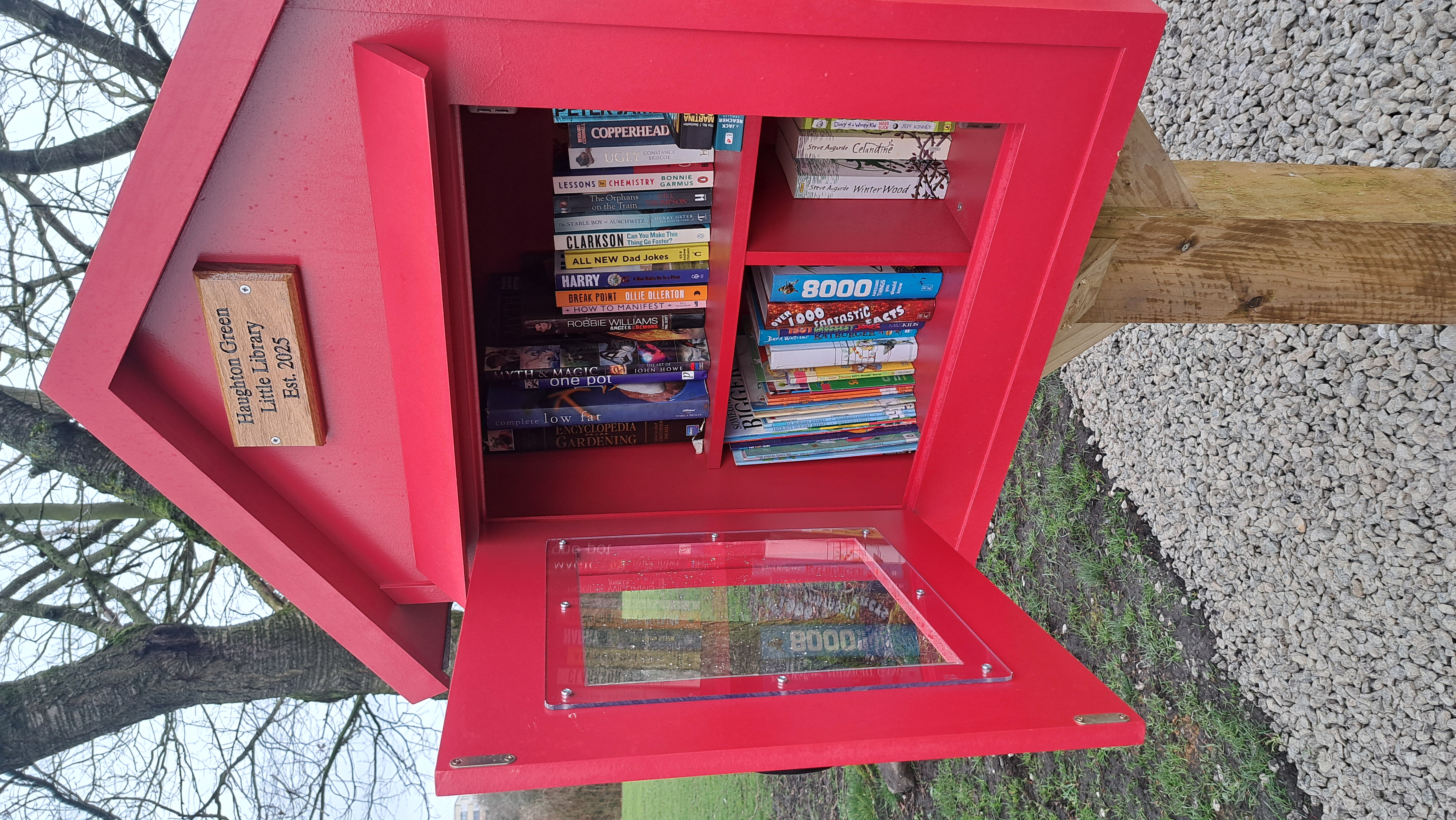 Red post box with books