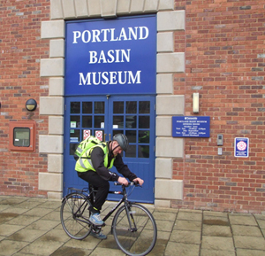 Member of staff cycling home