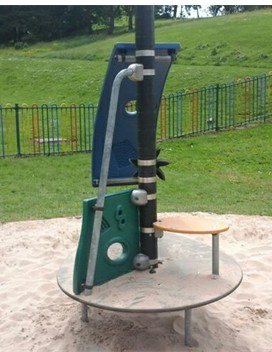 Multi-play unit including climbing unit, slide and ladder access situated on wetpour