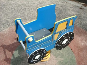 One inclusive swing with plasic harness and one flat swing situated on wetpour