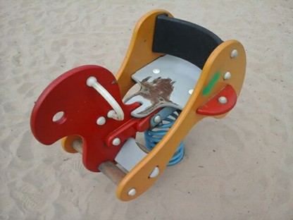 Chain tired swing situated on playbark