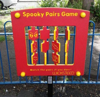Play panel situated on wetpour