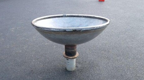 Inclusive metal spinning bowl situated on wetpour