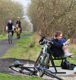 Image of bike riders and horse riders using a bridleway