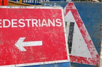 photograph of two roadside roadworks signs