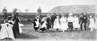 Whit Friday, Old Chapel Scholars' Sports. Reverend H. S. Tayler starting a race c. 1900 (Ref t14990)