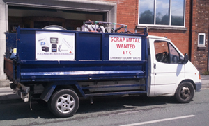 Image of a scrap metal collecting van