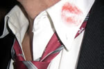Image of a man with lipstick on his collar