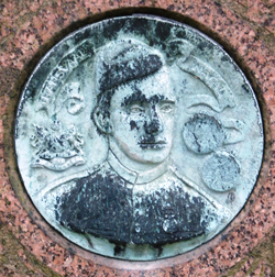 Portrait of George Henshaw on his headstone.