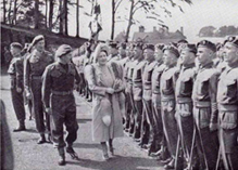 Queen Elizabeth Inspecting 1st battalion with Major Frampton