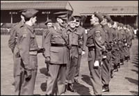 Brigadier F G R Brittoreous inspecting members of the Manchester Regiment Home Guard 1942-3c. (MRP/7/A)