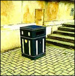 Example of a well positioned and maintained litter bin, set back from the open pedestrian domain