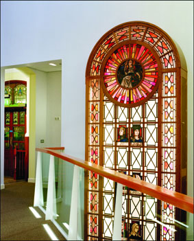 The Lakes Courtt Yard walk way and stain glass window